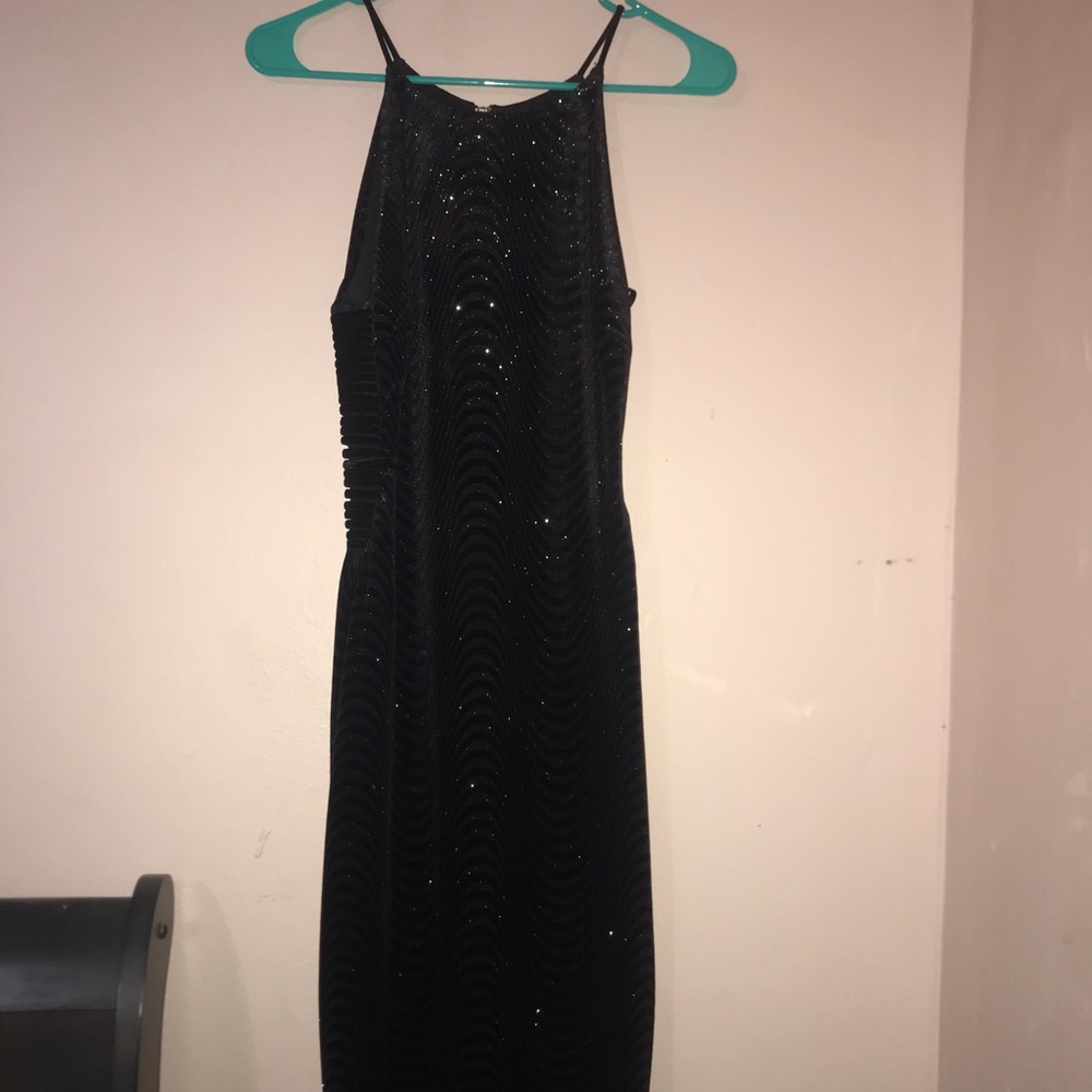 Long black glittery dress.